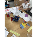 Embellishing their coin purses with buttons handles and attachments. 