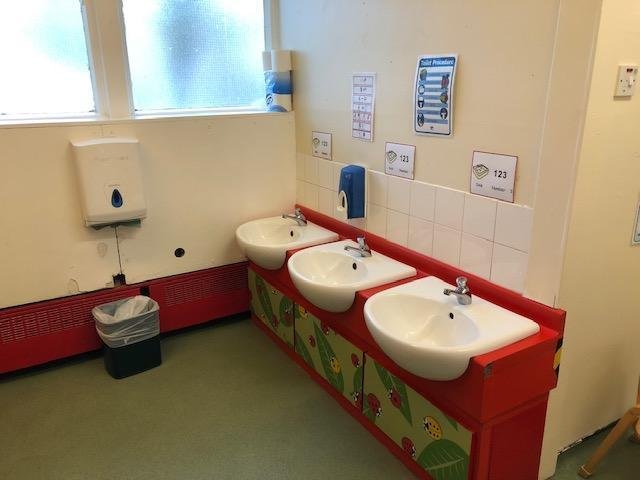 The sinks to wash your hands.